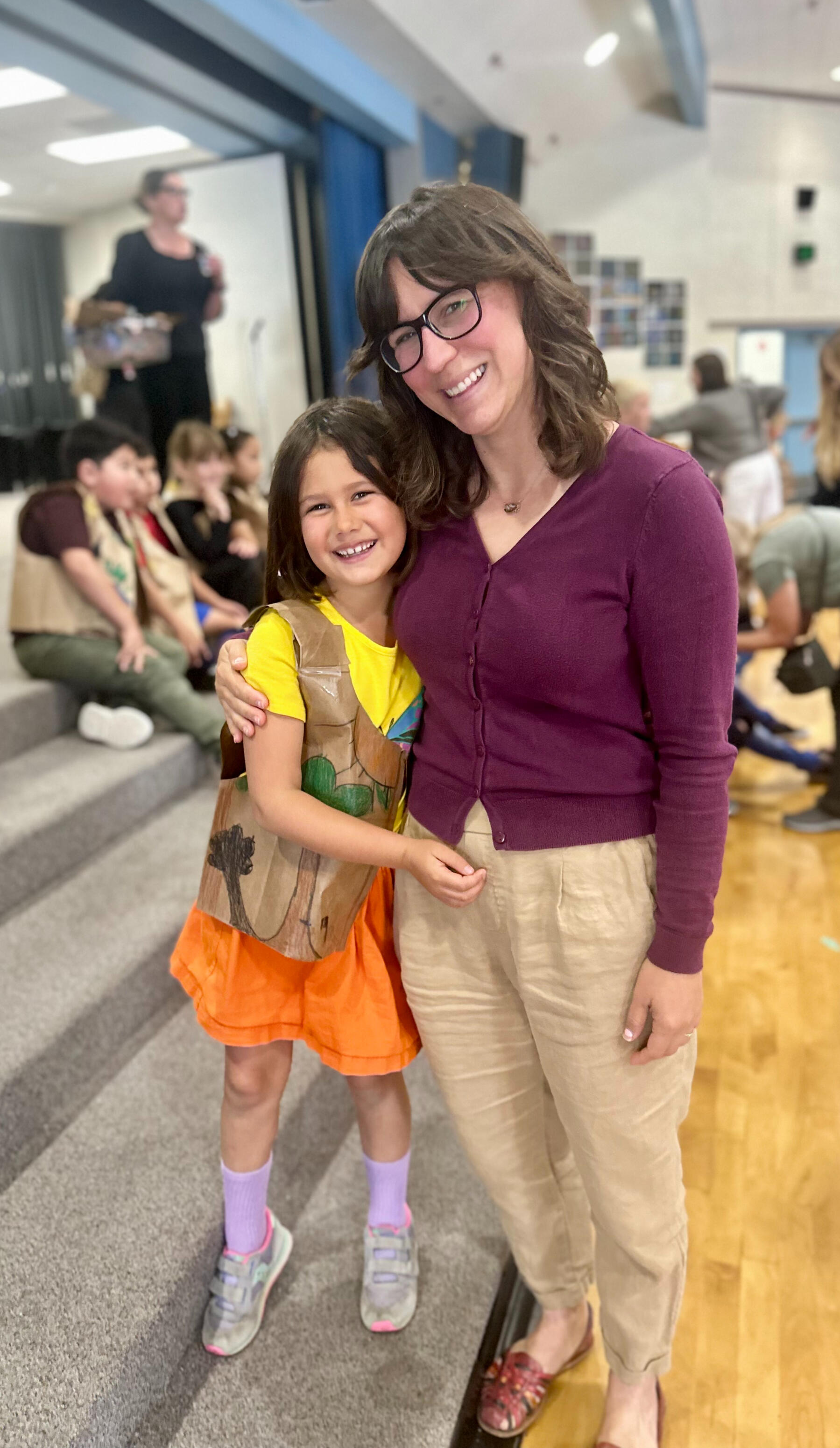 Marisa Gomez and her daughter at a school assembly